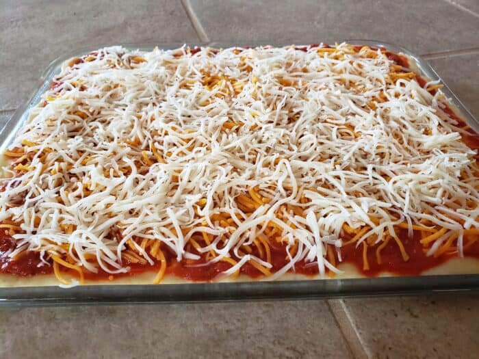 Mozzarella cheese on top of cheddar cheese