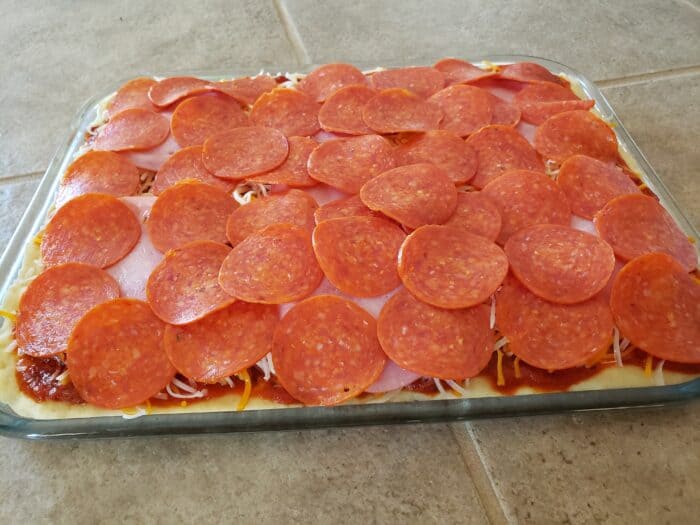 pepperoni on top of the Canadian bacon