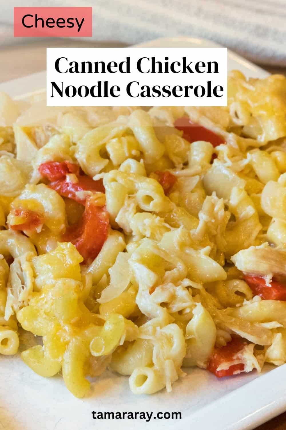 Baked cheesy canned chicken noodle casserole on a plate.