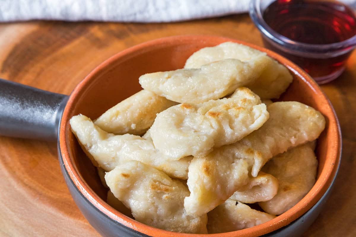 Fried dumplings with syrup.