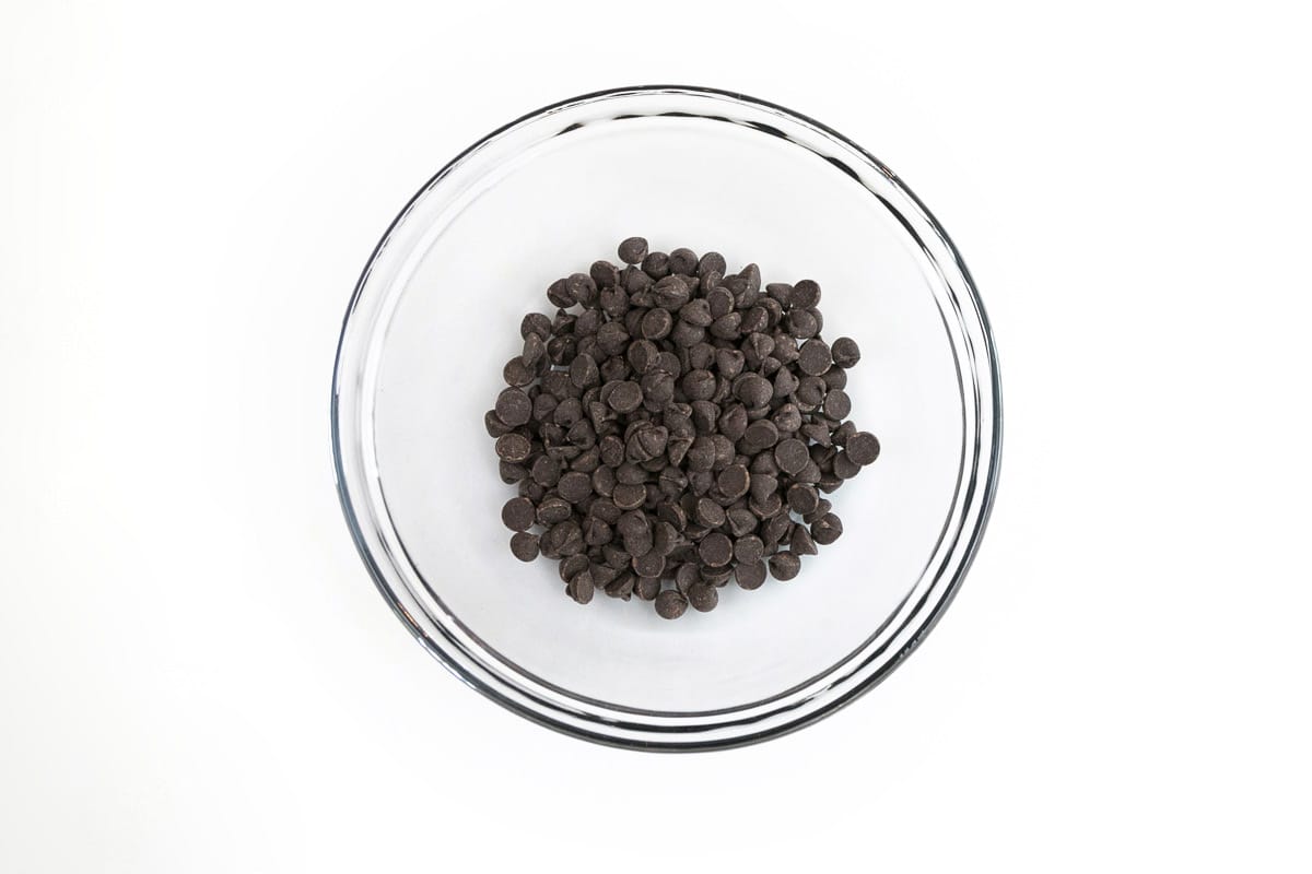 Semi-sweet chocolate chips in a microwave-safe bowl.