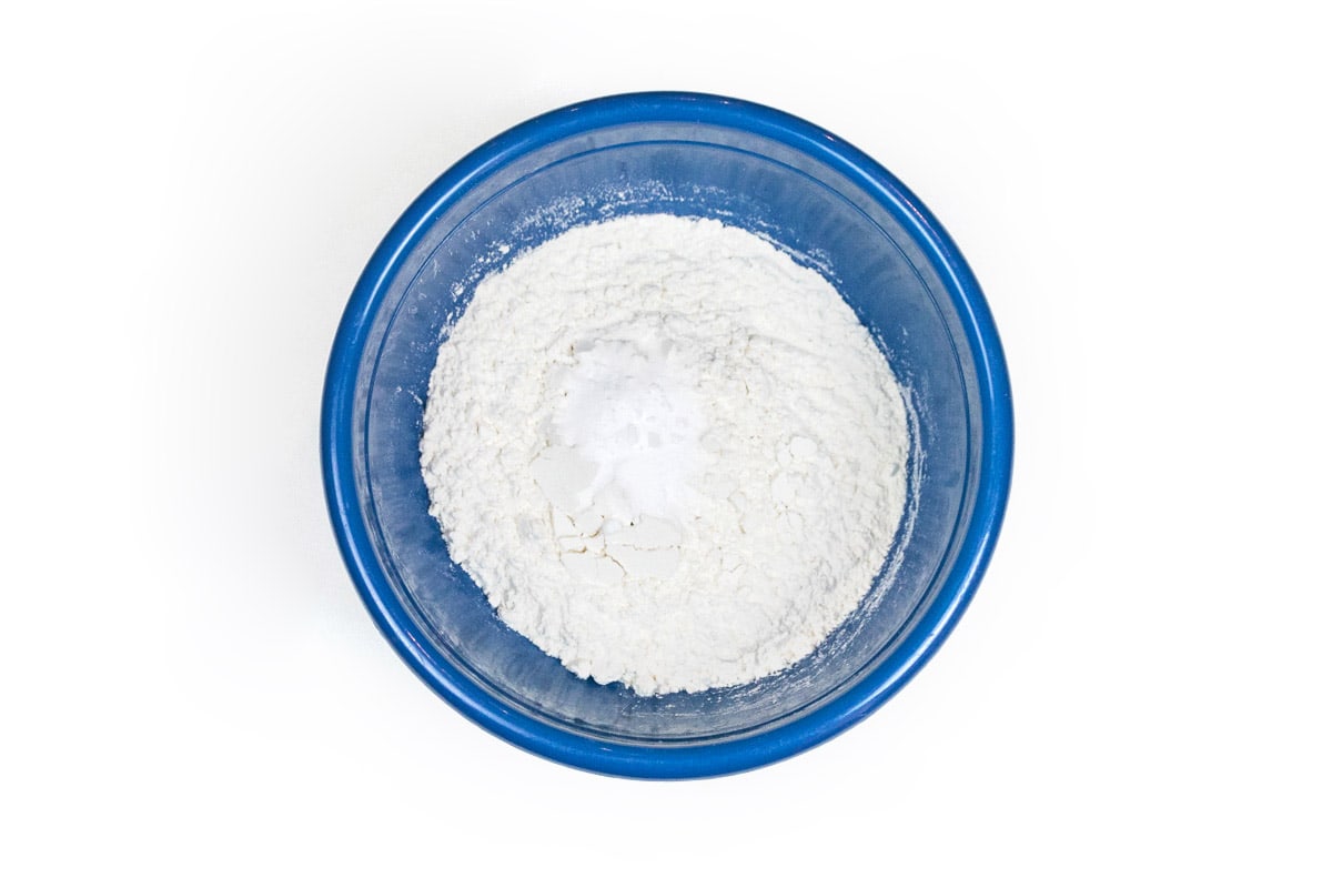 Flour, baking soda, and salt in a bowl.
