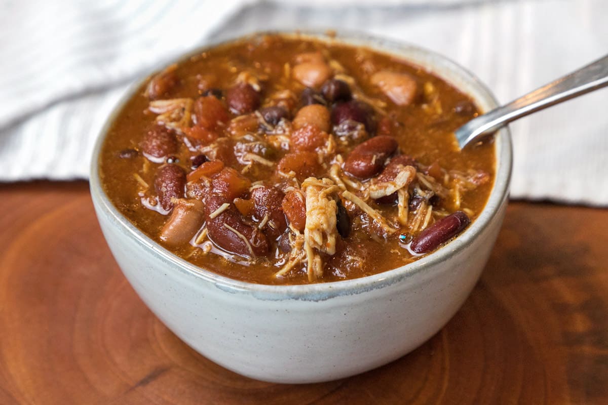 Chicken chili with black beans in a bowl.