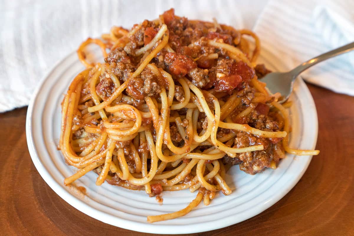 Instant Pot Spaghetti close up on a white plate.