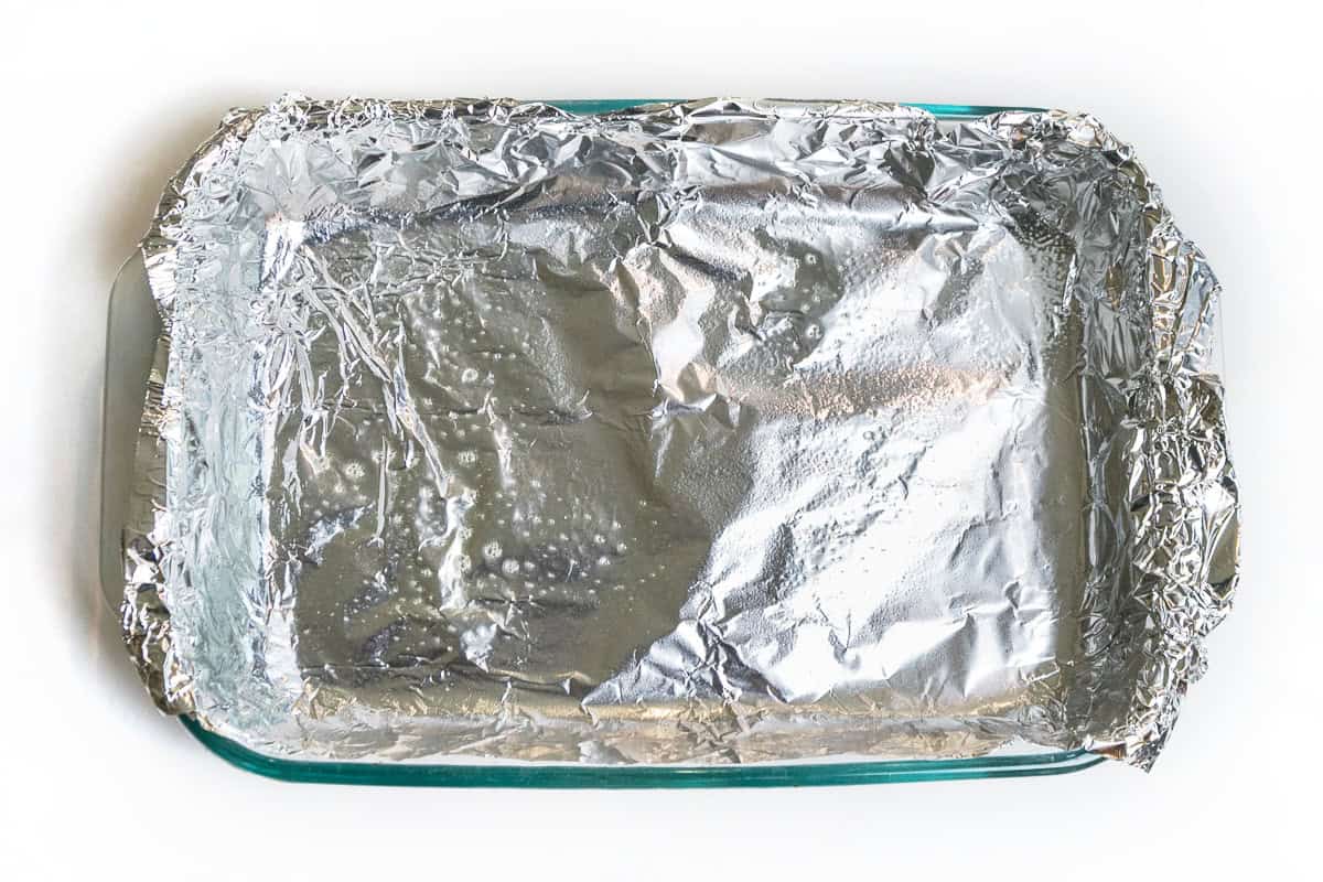 Baking dish lined with aluminum foil.