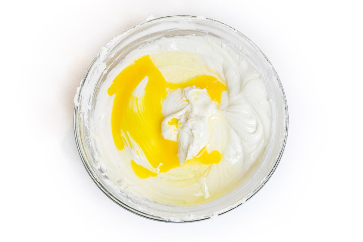 Eggs are added to the cream cheese mixture.