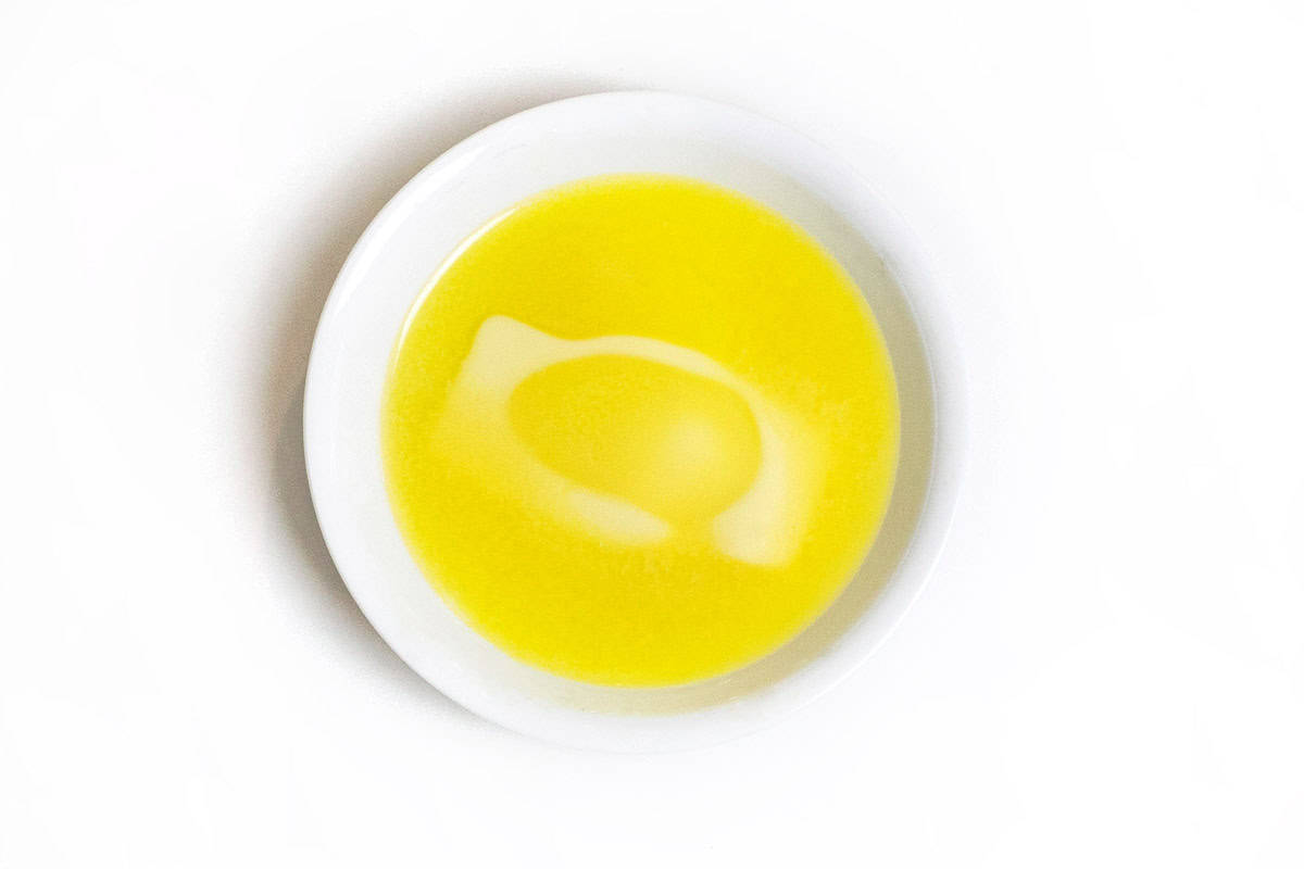 Melted butter in a bowl.