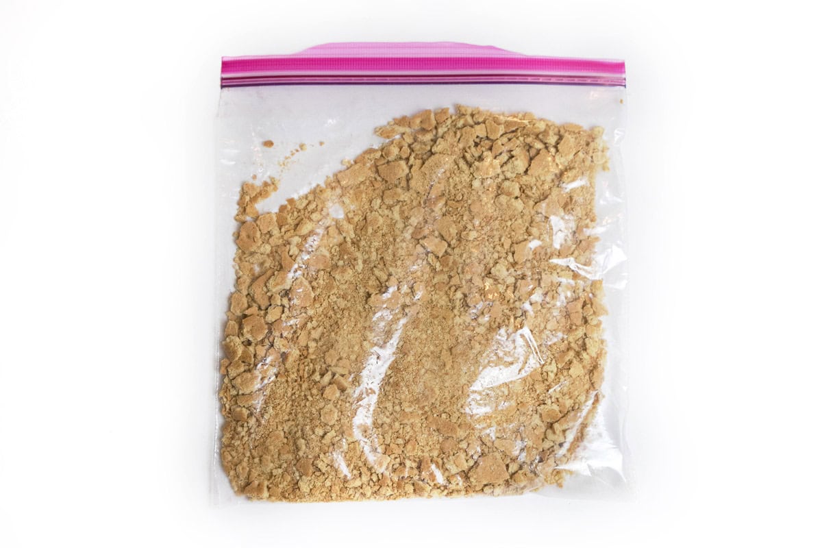 Crushed graham crackers in a bag.