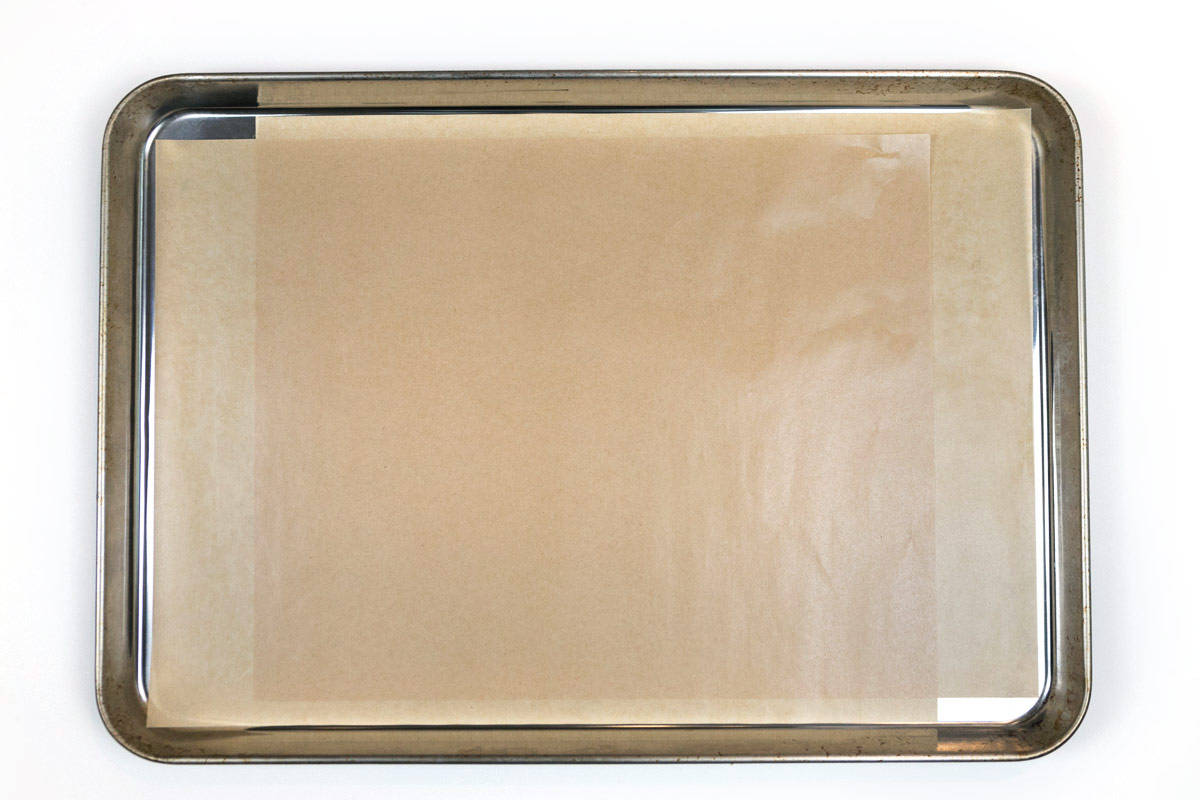 Line a cookie sheet with parchment paper.