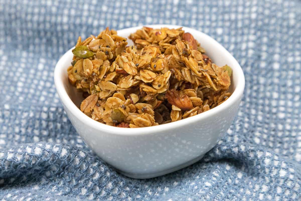 Almond granola recipe with honey in a bowl.