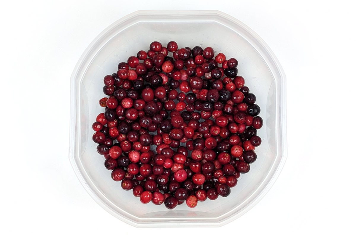 Fresh cranberries in a bowl.