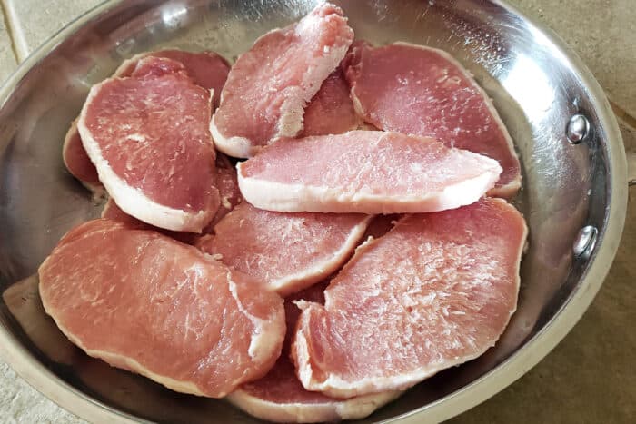 pork chops in frying pan