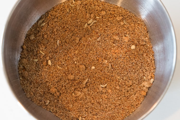 Dry rub seasoning spices added together.
