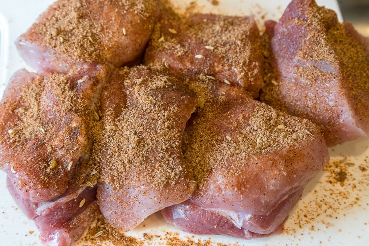 Dry seasoning rubbed on pork chunks.