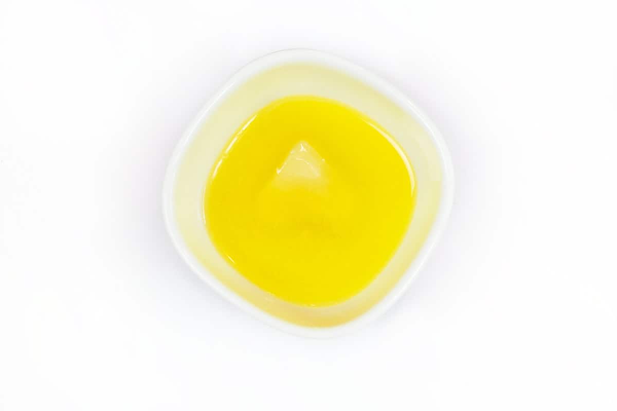 Melted butter in a bowl.