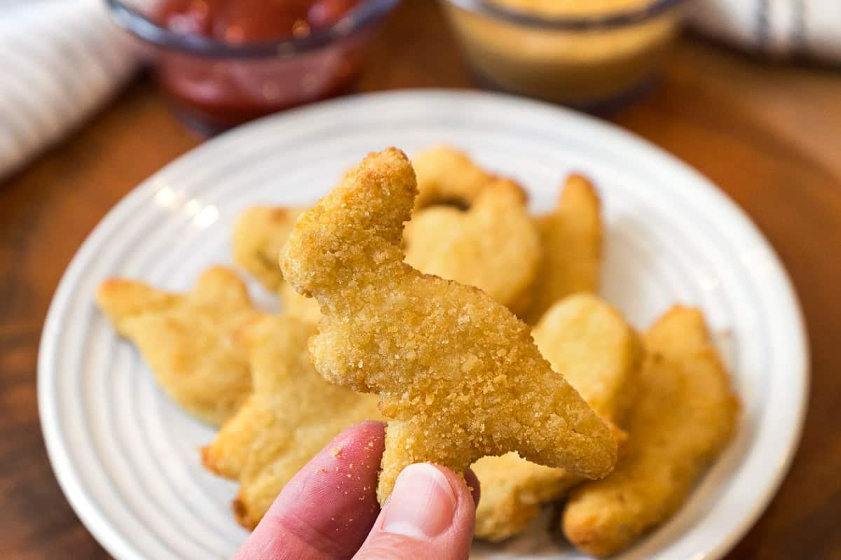 Air fryer Dino nuggets on a plate.