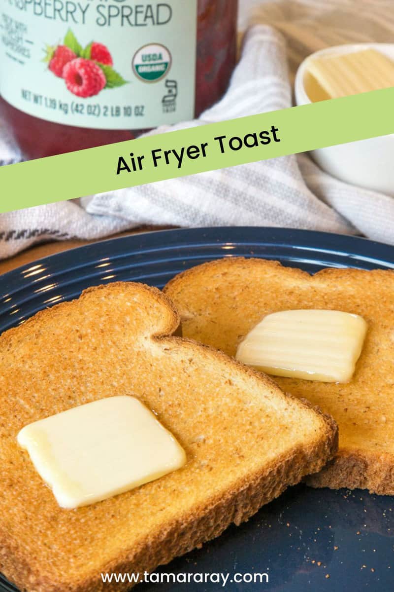 Two slices of air fryer toast with butter on a plate.