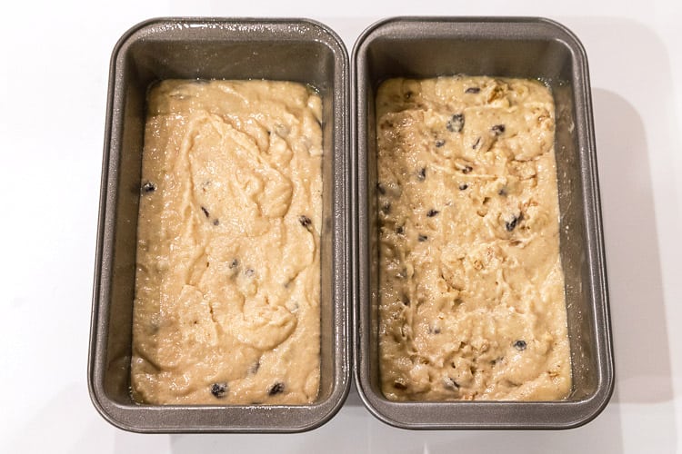 Put the applesauce batter into loaf pans.