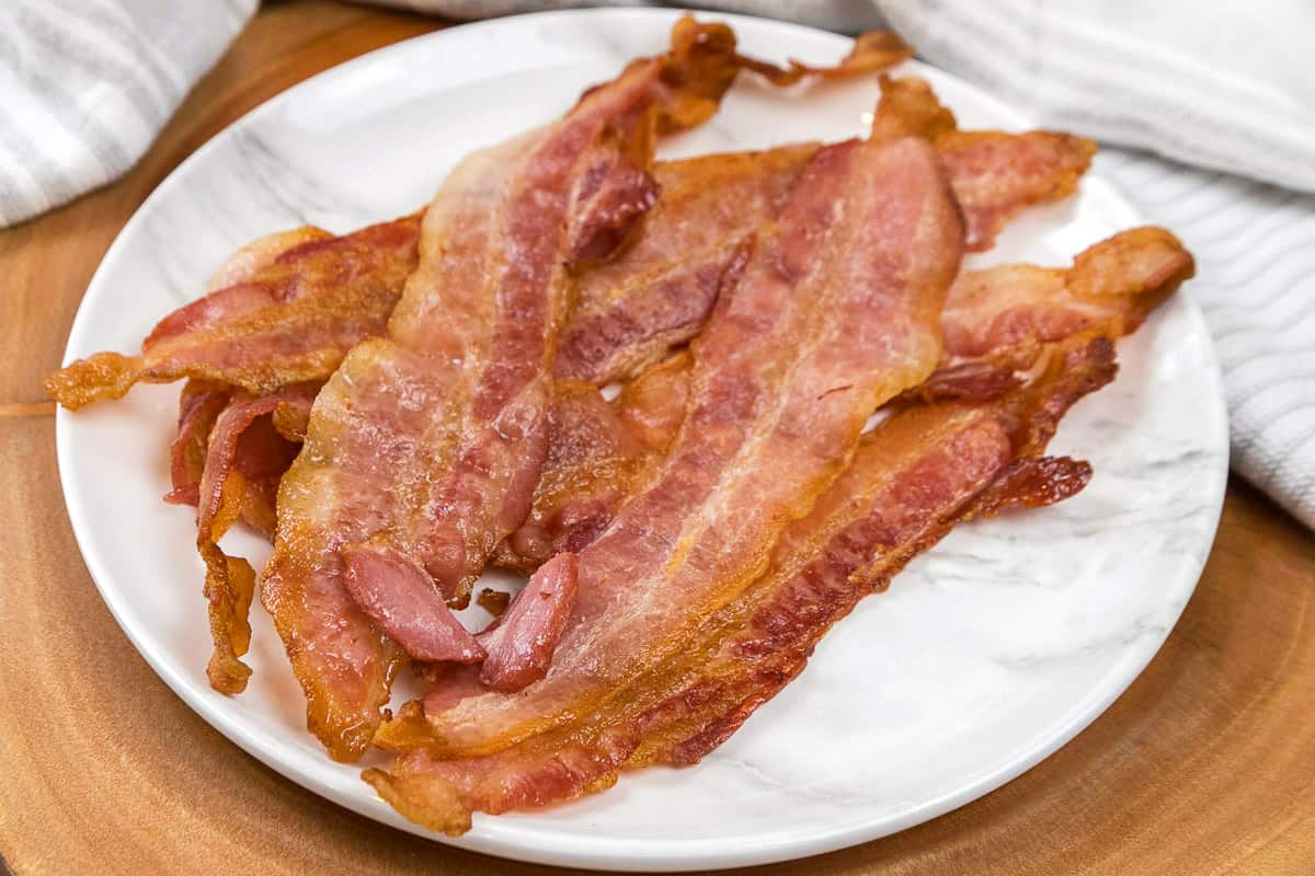Air fryer bacon on a plate.