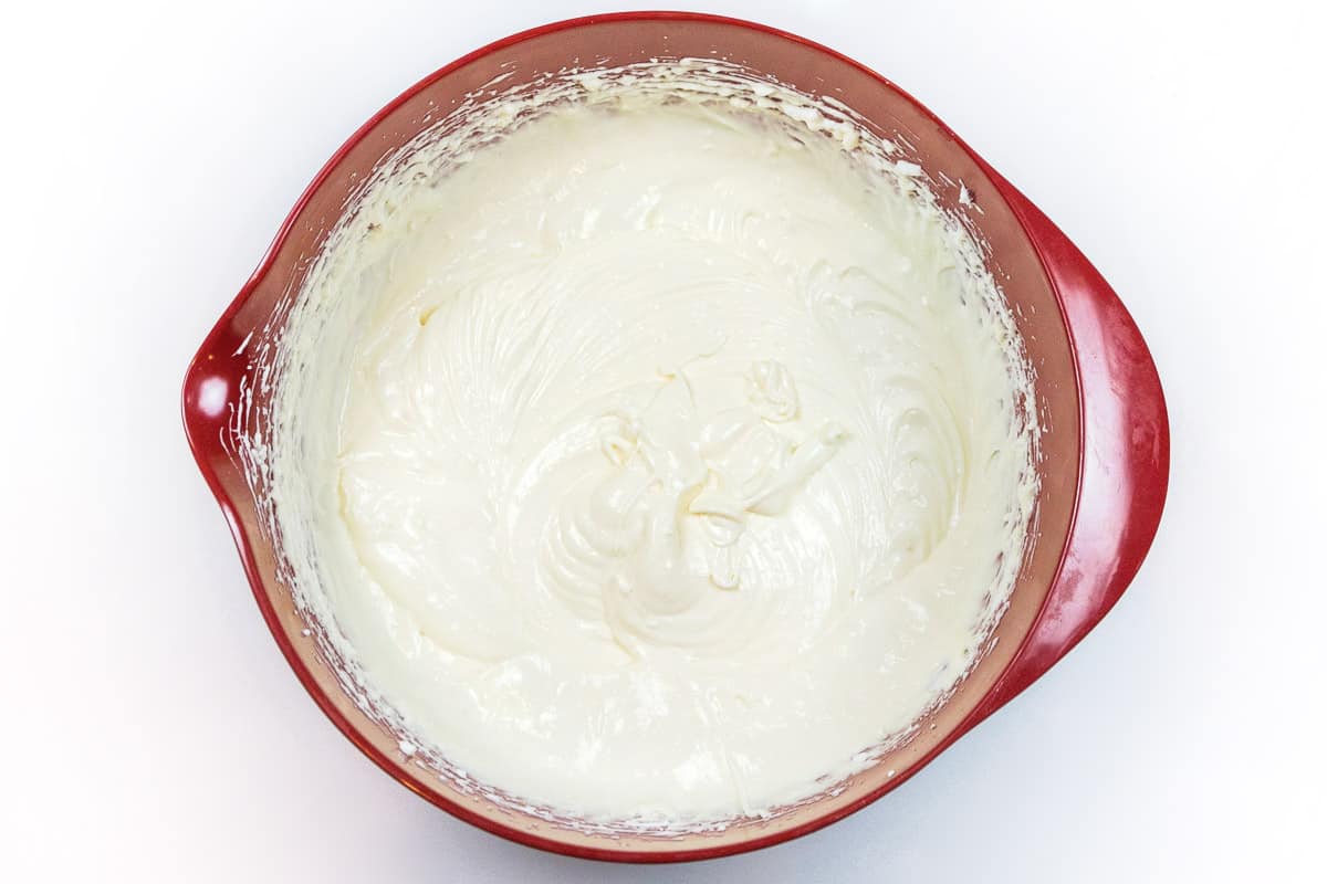 The cheesecake pudding and the cream cheese and whipped topping are completely mixed until smooth.