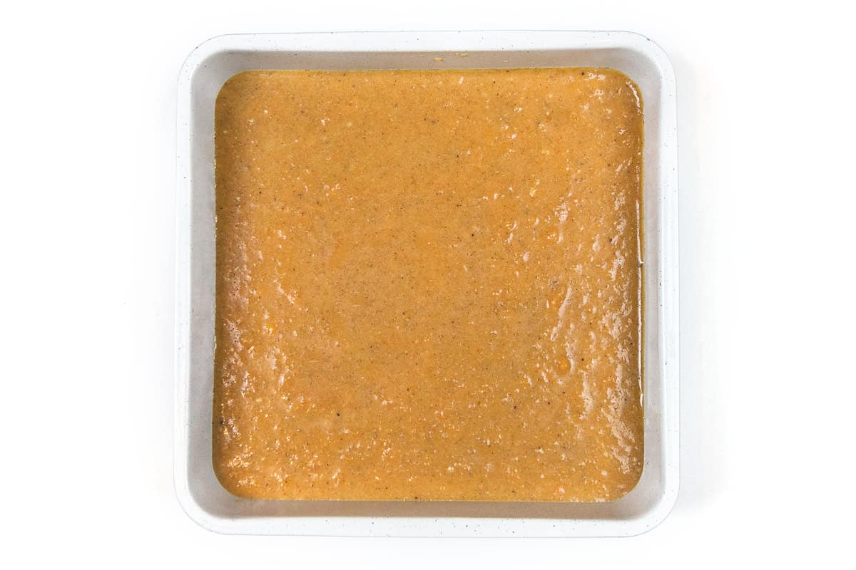 The sweet potato mixture is poured into a baking dish.
