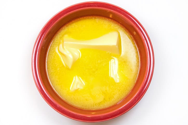 Melted butter in a bowl.