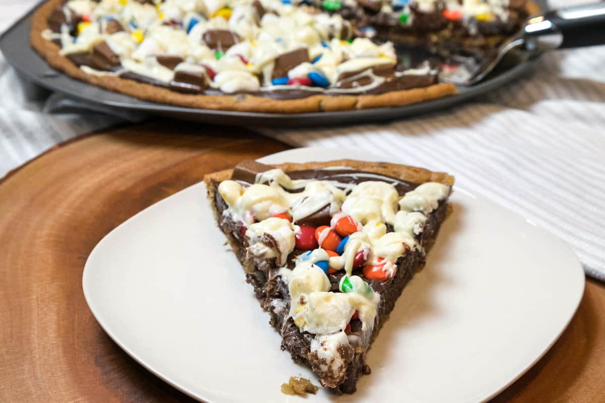 A slice of cookie pizza.