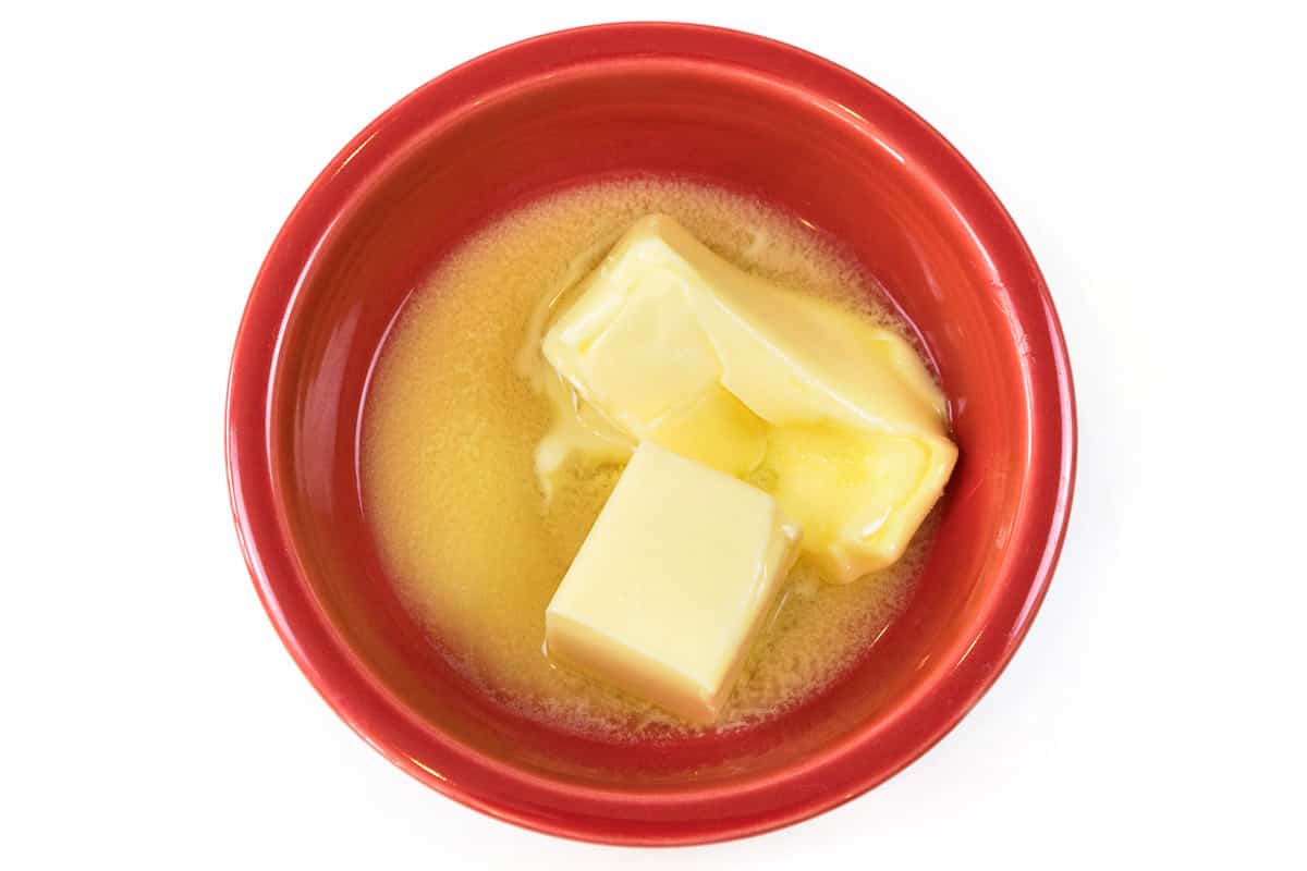 Three-fourths of a cup of softened butter in a bowl.