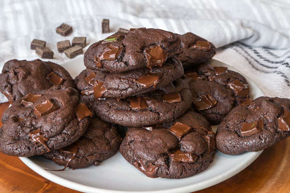 Dark chocolate cookies on a plate.