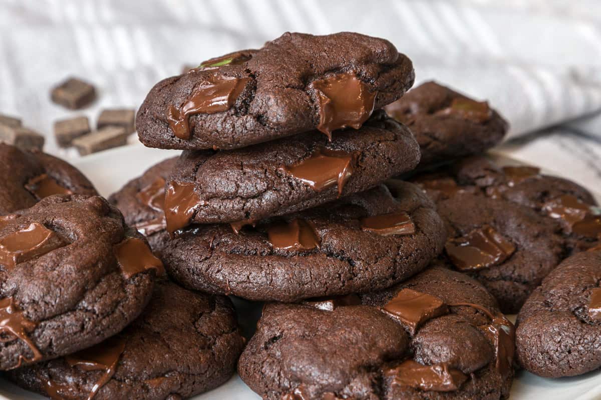 Dark chocolate cookies on a plate.