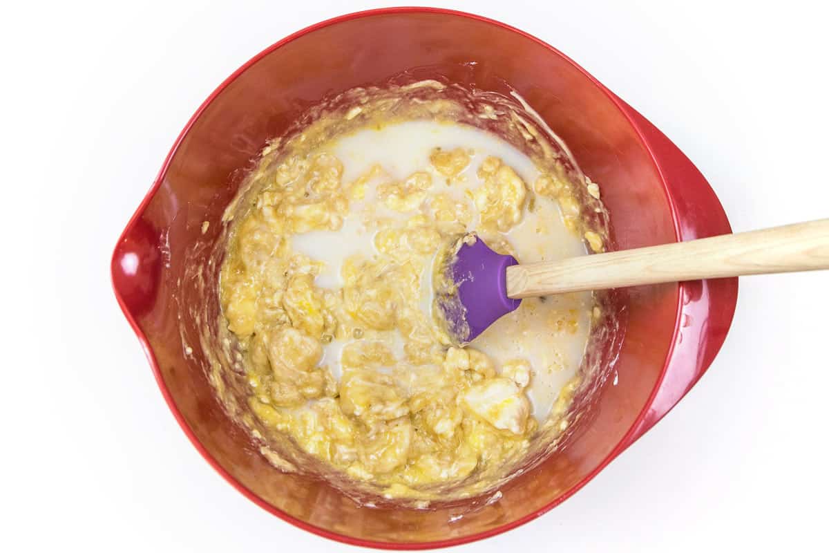 The milk is added to the banana mixture.