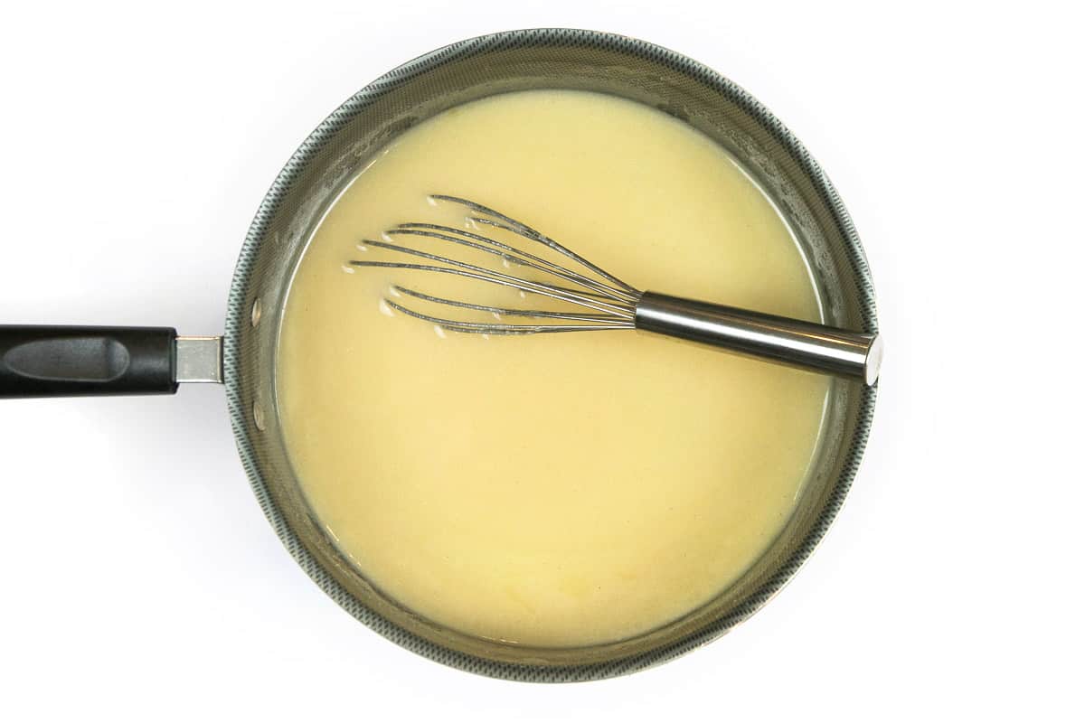 Butter, sugar, and evaporated milk in a saucepan.