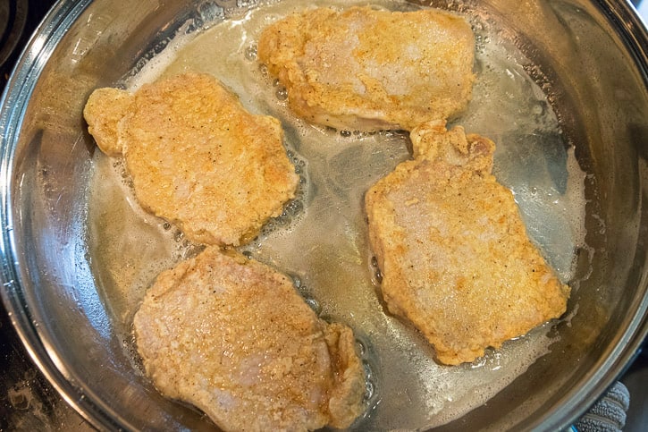 Fried Pork Chops Recipe in the frying pan.