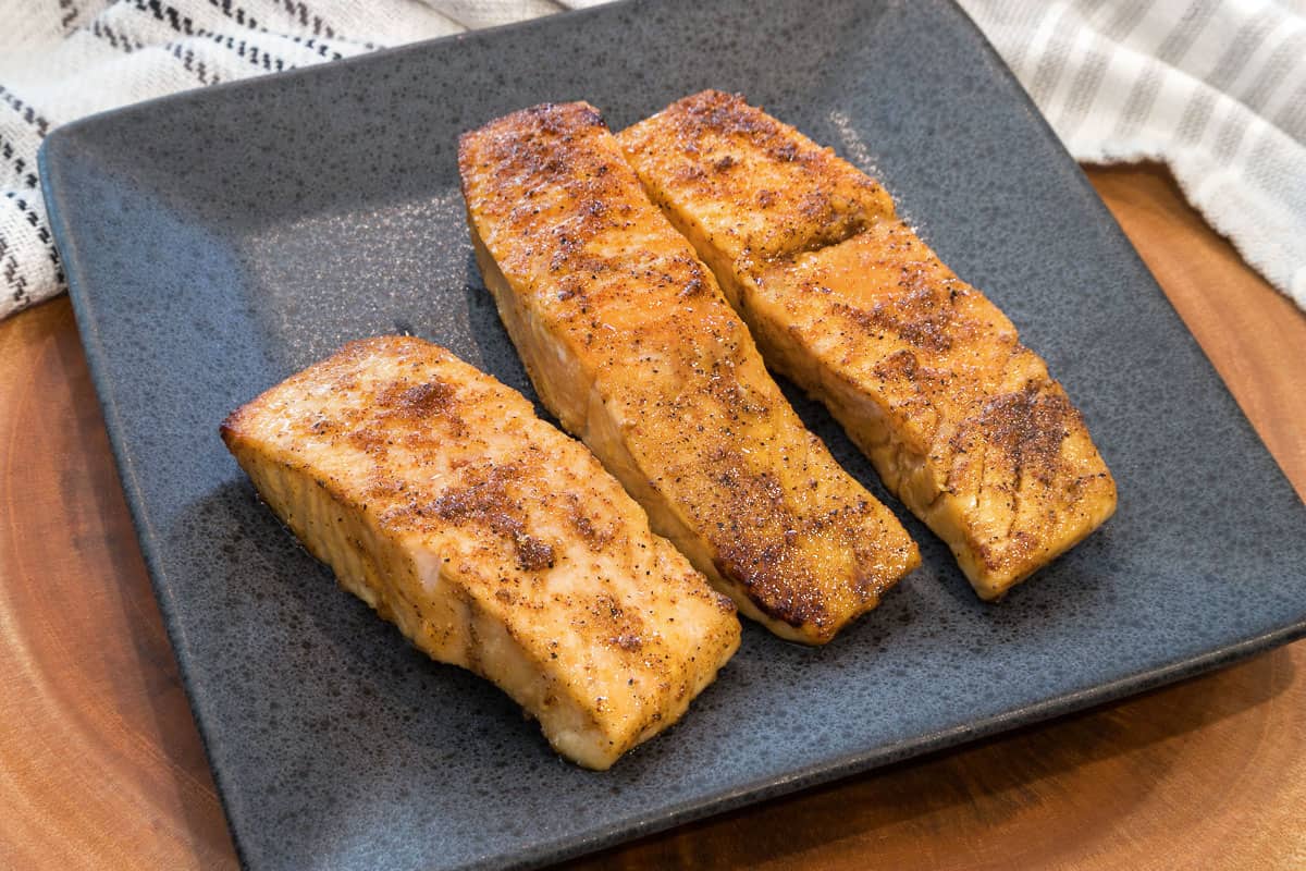 Salmon fillets on a plate.