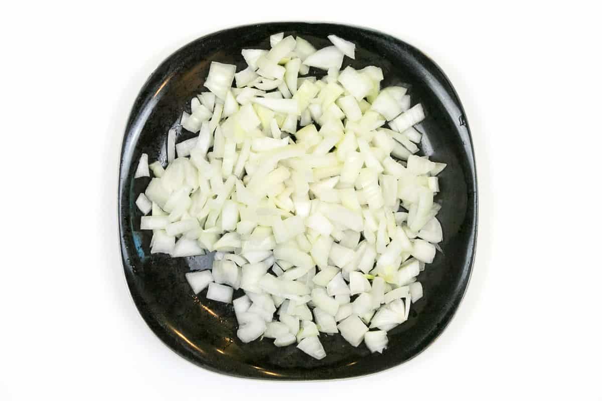 Diced onions on a plate.
