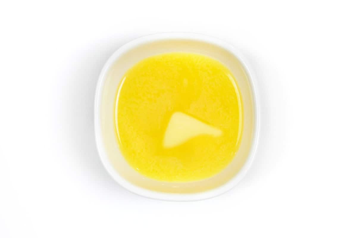 Melted butter in a bowl.