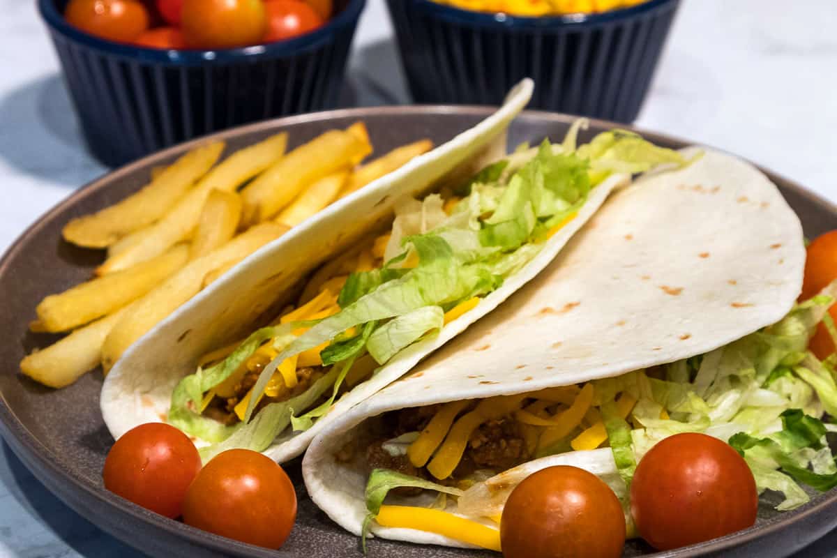 Ground beef tacos with salsa.