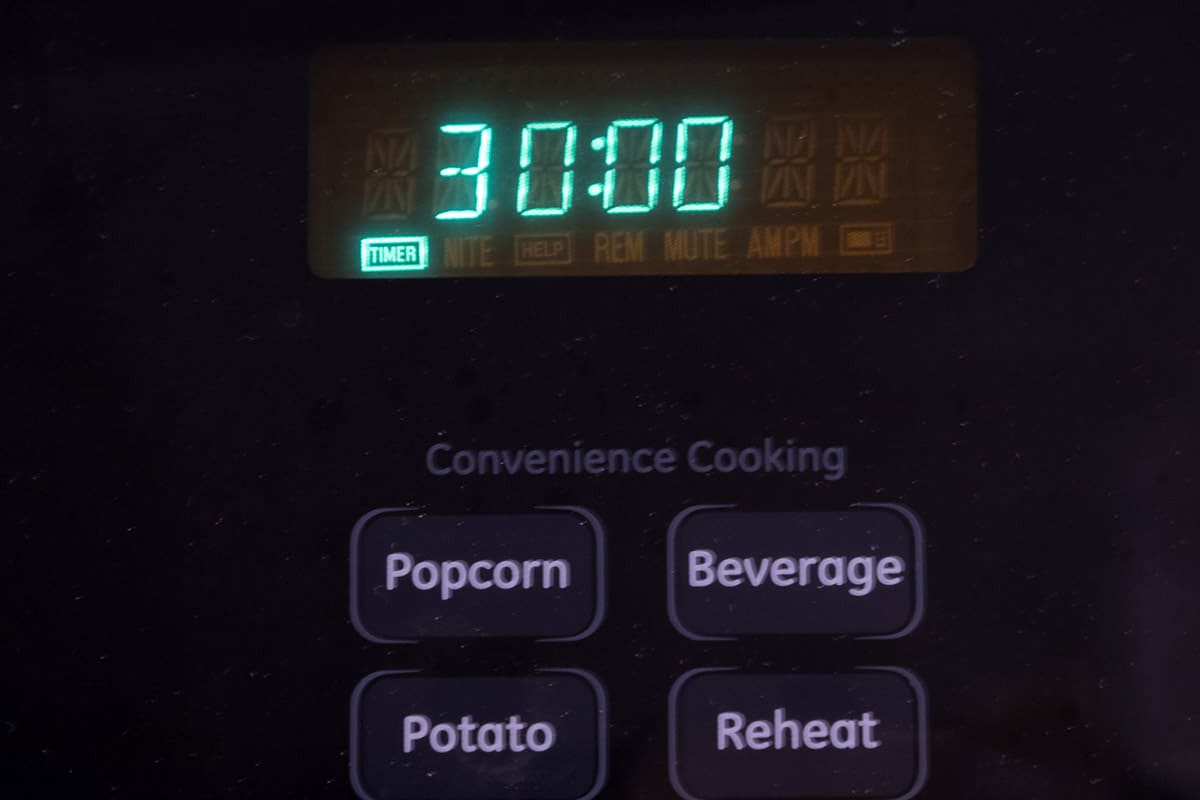 Set the oven to three hundred and twenty-five degrees Fahrenheit for thirty minutes.