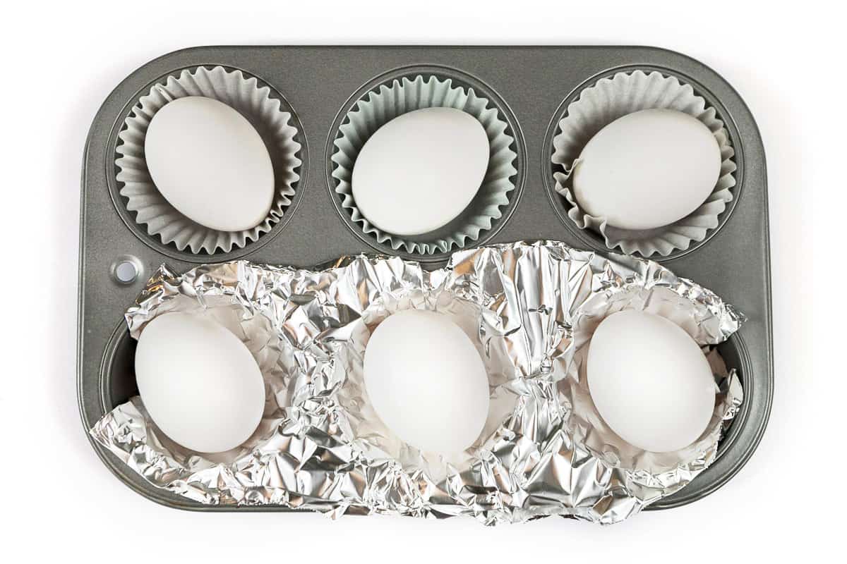 Six eggs in a six-cup muffin tin.