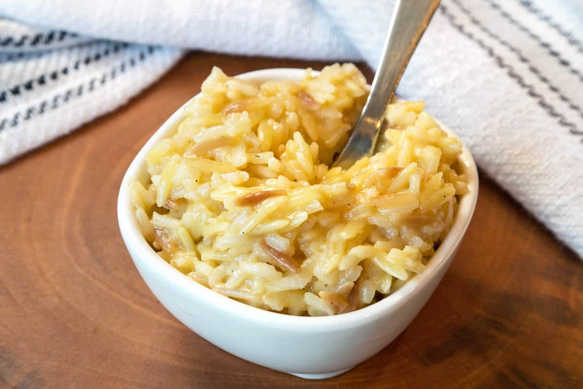 Homemade Rice-A-Roni with cheese in a bowl.