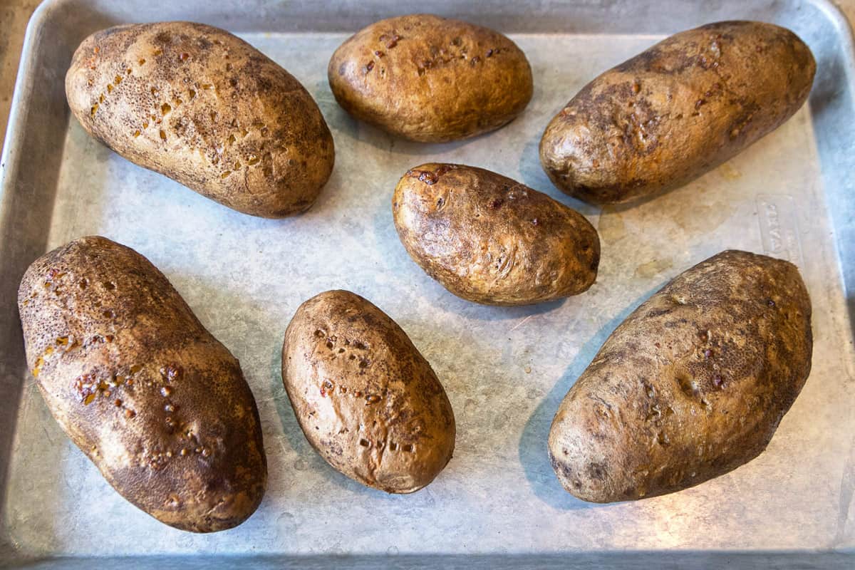 Poke holes in the potatoes with a fork.