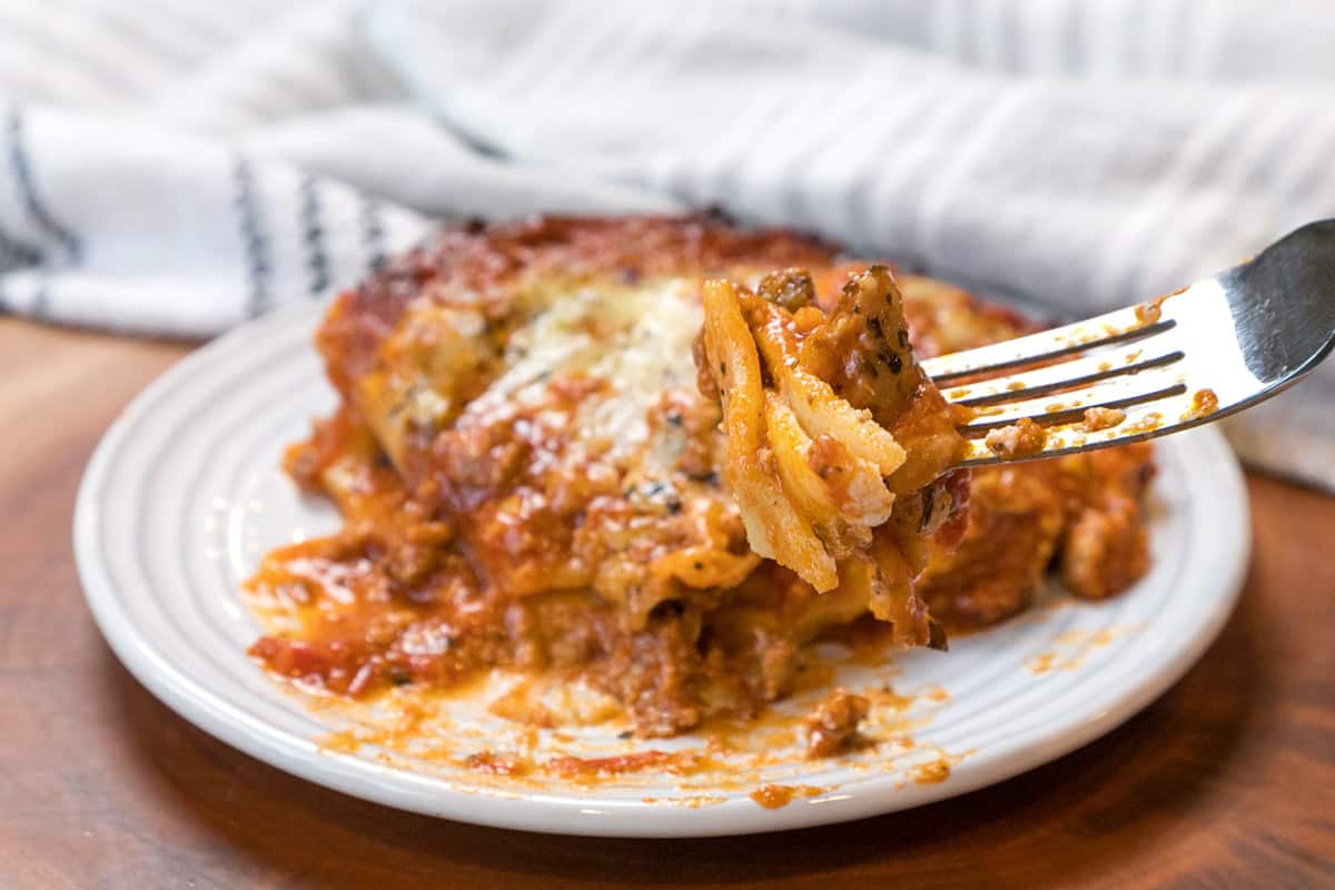 Cooked frozen lasagna on a plate.