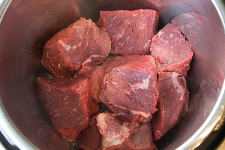 Roast cut into cubes and put in the instant pot.