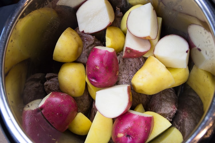 Put all of the potatoes in the Instant Pot with the browned chuck roast.