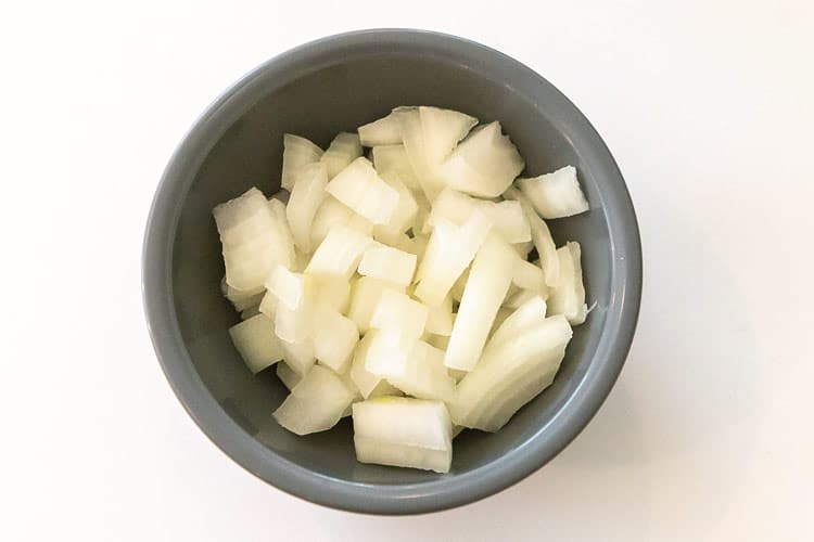 Chopped onions in a bowl.