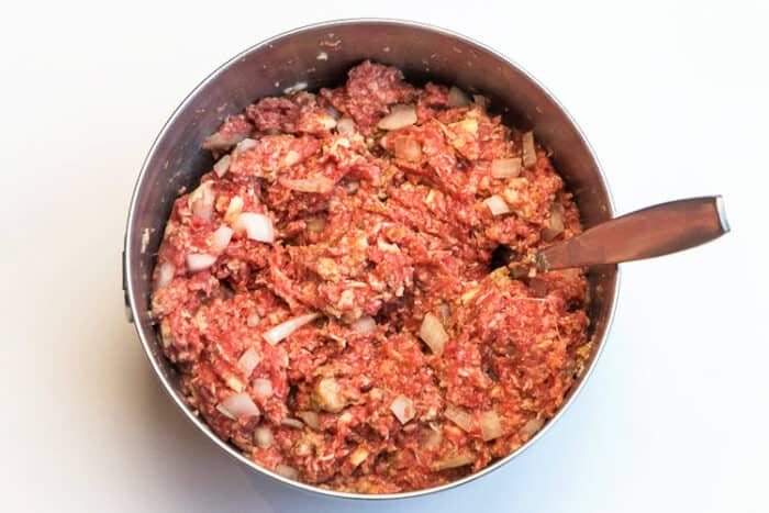 Onions and seasonings mixed with lean ground beef.