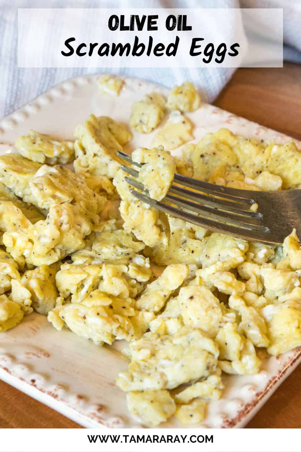 Olive oil scrambled eggs on a plate.