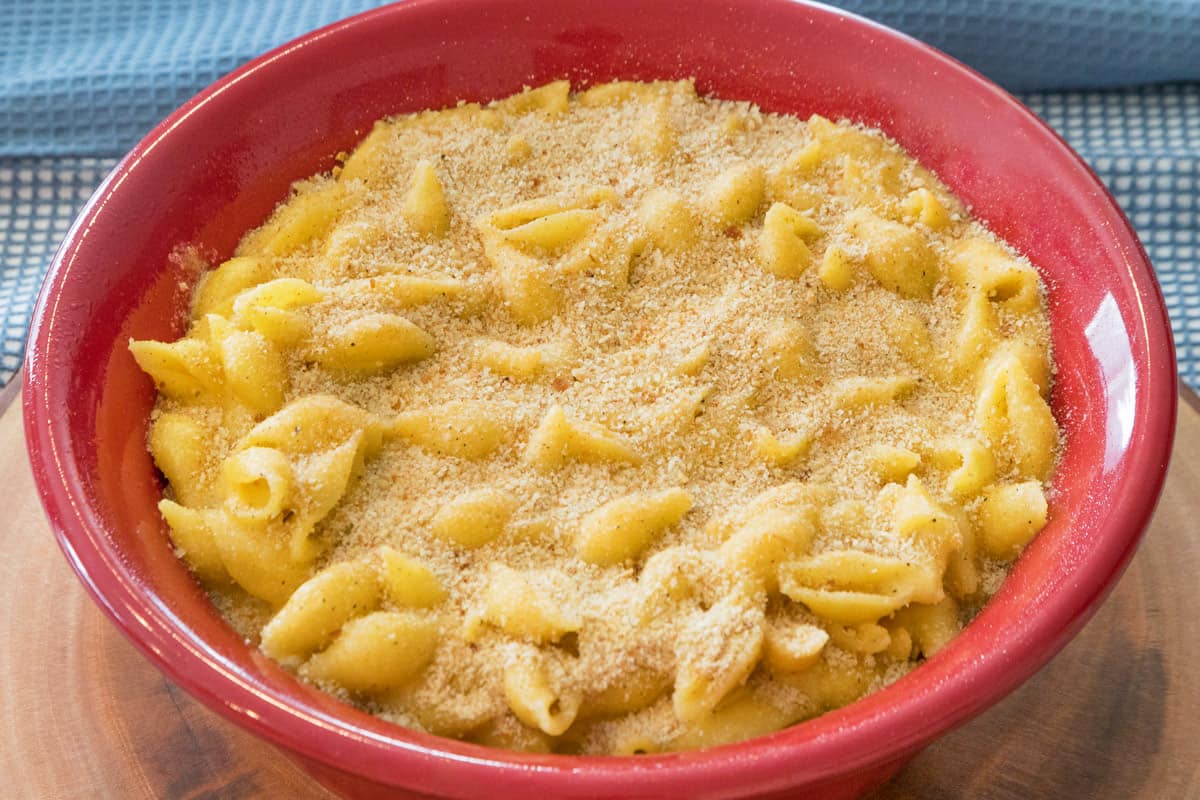 A bowl of mac and cheese out of the broiler oven