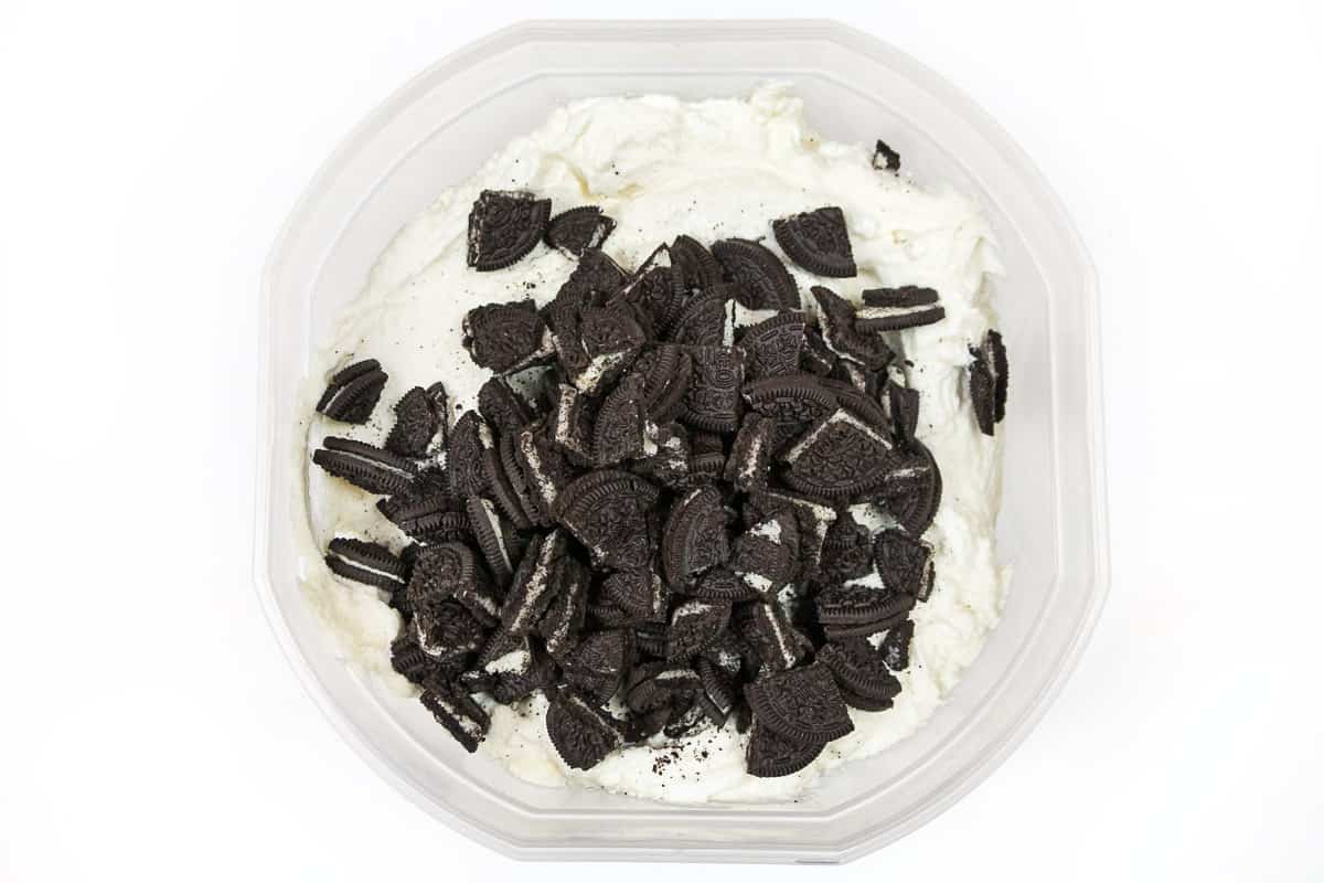 Add the Oreo cookie pieces to the semi-frozen ice cream.