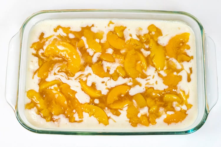 The peaches are added to the Bisquick mixture.